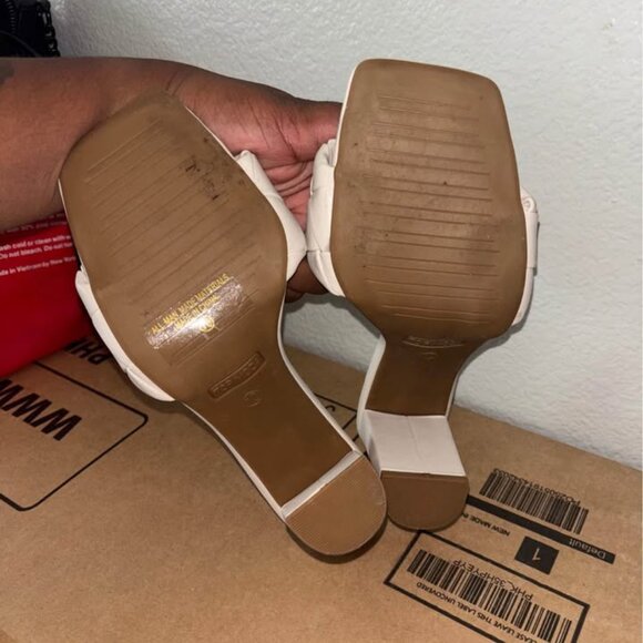 This is a pair of white square-toe flat sandals from the brand "TOP MODA". - Picture 3 of 5